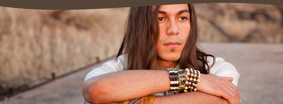 Pensive young Native American man.